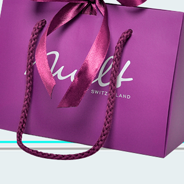 Luxe op maat bedrukte paarse volledig bedrukte kartonnen papieren zak met strikhandvat voor geschenkverpakkingen
