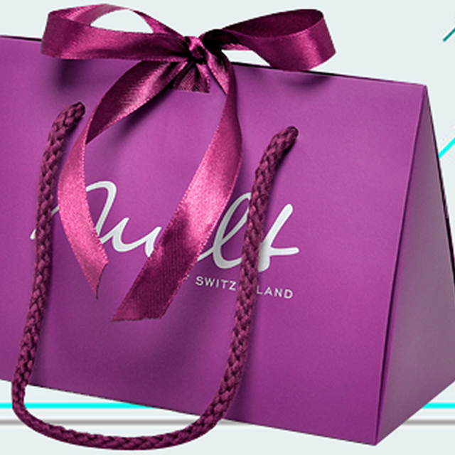 Luxe op maat bedrukte paarse volledig bedrukte kartonnen papieren zak met strikhandvat voor geschenkverpakkingen